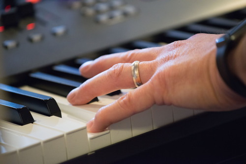 Joe's hand playing keyboard at the Shades of Grey band practice in Barrhaven, Ontario, April 5, 2017. Photo by Garth Gullekson