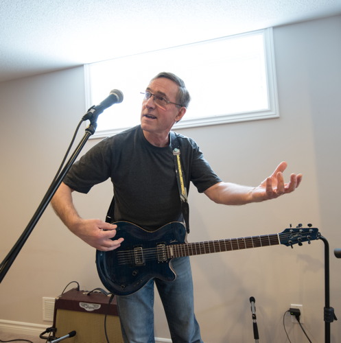 Marc playing air guitar at the Shades of Grey band practice in Barrhaven, Ontario, April 5, 2017. Photo by Garth Gullekson