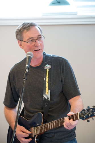 Marc playing guitar at the Shades of Grey band practice in Barrhaven, Ontario, April 5, 2017. Photo by Garth Gullekson