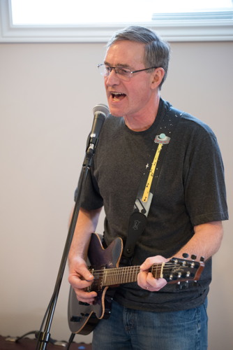 Marc is singing and playing his guitar at the Shades of Grey band practice in Barrhaven, Ontario, April 5, 2017. Photo by Garth Gullekson